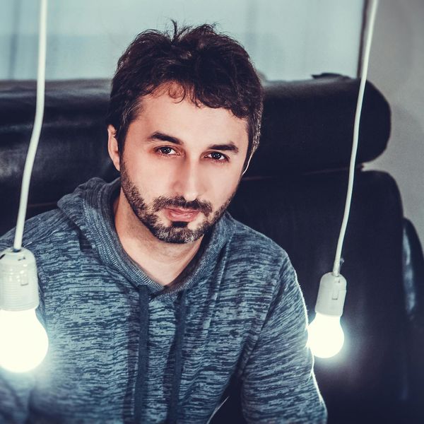 Person looking towards a bright horizon with a clear and focused gaze.